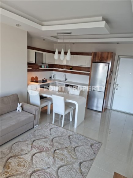 Просторная квартира 1+1, общей площадью 70 м2, на 8-м этаже в центре современного района Аланьи - Махмутлар-id-7502-фото-3