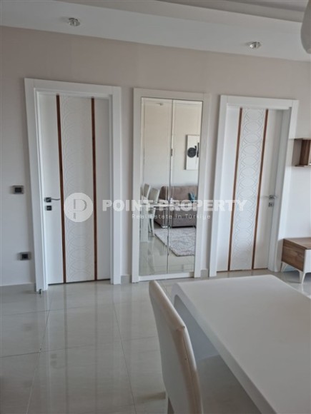 Просторная квартира 1+1, общей площадью 70 м2, на 8-м этаже в центре современного района Аланьи - Махмутлар-id-7502-фото-5