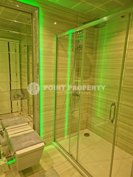 Просторная квартира 1+1, общей площадью 70 м2, на 8-м этаже в центре современного района Аланьи - Махмутлар-id-7502-фото-9