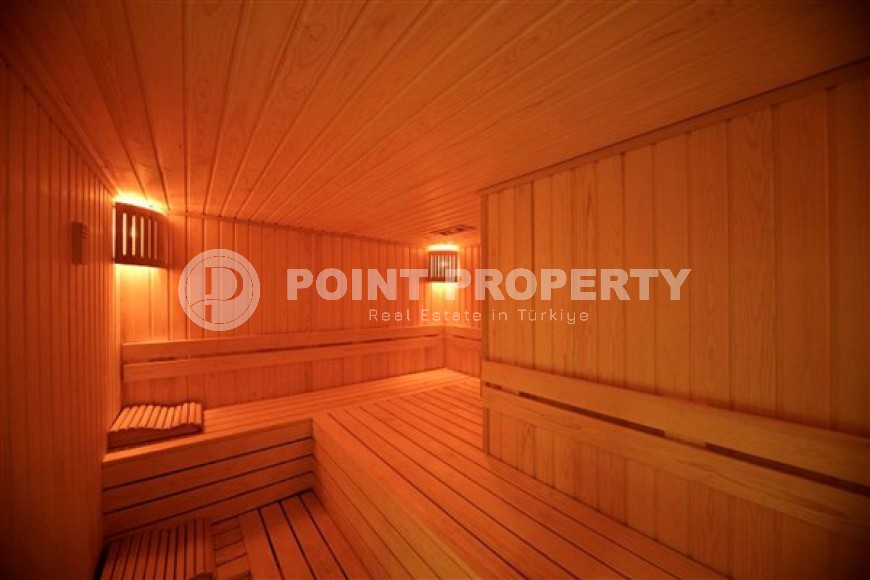 Просторная квартира 1+1, общей площадью 70 м2, на 8-м этаже в центре современного района Аланьи - Махмутлар-id-7502-фото-14