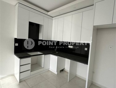 Panoramic apartment 1+1 with city views, on the 8th floor in the center of Mahmutlar-id-7506-photo-3