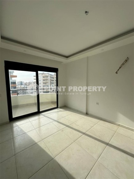 Панорамная квартира 1+1 с видом на город, на 8-м этаже в центре района Махмутлар-id-7506-фото-4