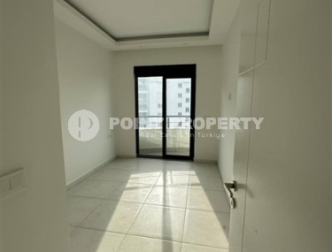 Panoramic apartment 1+1 with city views, on the 8th floor in the center of Mahmutlar-id-7506-photo-5