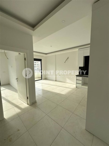 Панорамная квартира 1+1 с видом на город, на 8-м этаже в центре района Махмутлар-id-7506-фото-6