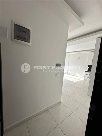 Панорамная квартира 1+1 с видом на город, на 8-м этаже в центре района Махмутлар-id-7506-фото-7