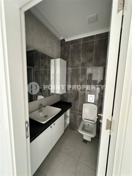 Панорамная квартира 1+1 с видом на город, на 8-м этаже в центре района Махмутлар-id-7506-фото-8