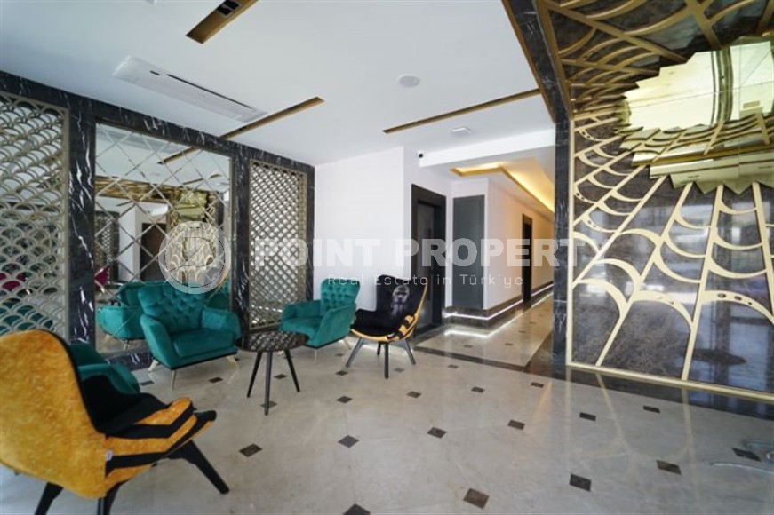 Панорамная квартира 1+1 с видом на город, на 8-м этаже в центре района Махмутлар-id-7506-фото-22