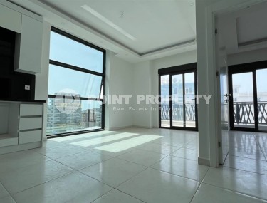 Small new apartment with fine finishing, 650 meters from the sea, in the center of the modern area of Alanya - Mahmutlar-id-7507-photo-2