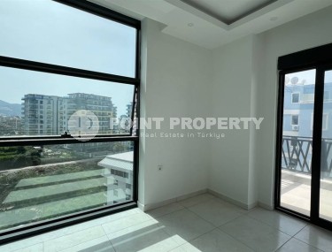 Small new apartment with fine finishing, 650 meters from the sea, in the center of the modern area of Alanya - Mahmutlar-id-7507-photo-4