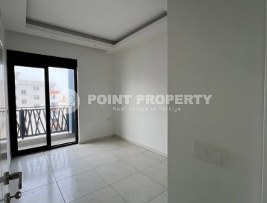 Small new apartment with fine finishing, 650 meters from the sea, in the center of the modern area of Alanya - Mahmutlar-id-7507-photo-5