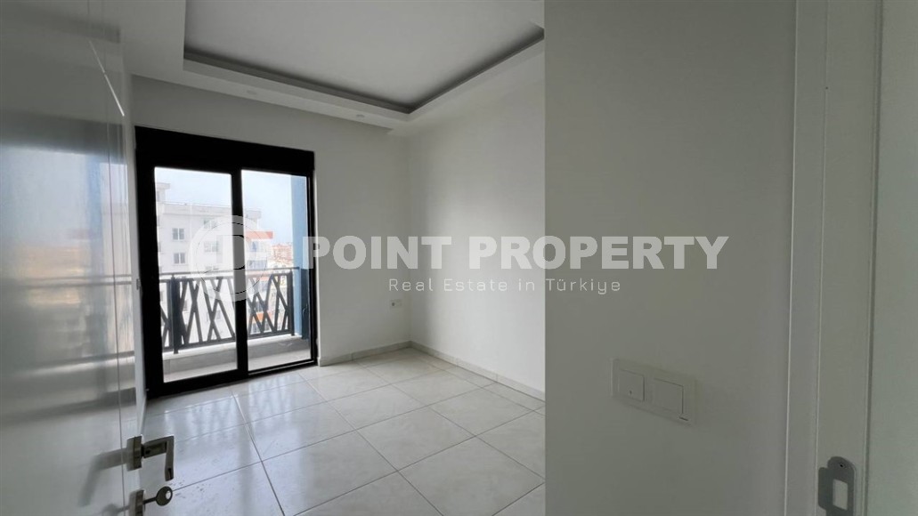 Небольшая новая квартира с чистовой отделкой, в 650 метрах от моря, в центре современного района Аланьи - Махмутлар-id-7507-фото-5