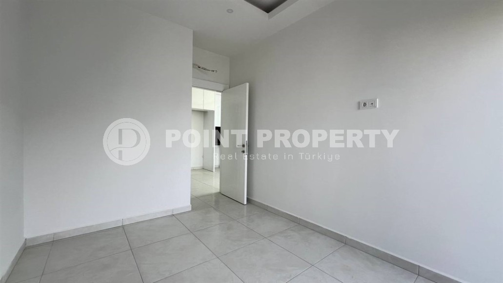 Небольшая новая квартира с чистовой отделкой, в 650 метрах от моря, в центре современного района Аланьи - Махмутлар-id-7507-фото-6