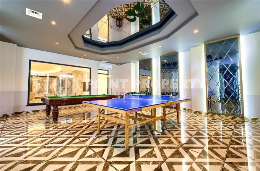 Небольшая новая квартира с чистовой отделкой, в 650 метрах от моря, в центре современного района Аланьи - Махмутлар-id-7507-фото-17