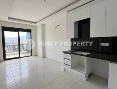 New 1+1 apartment, with a total area of 50 m2, on the 10th floor in a residential complex, commissioned in 2022-id-7508-photo-3