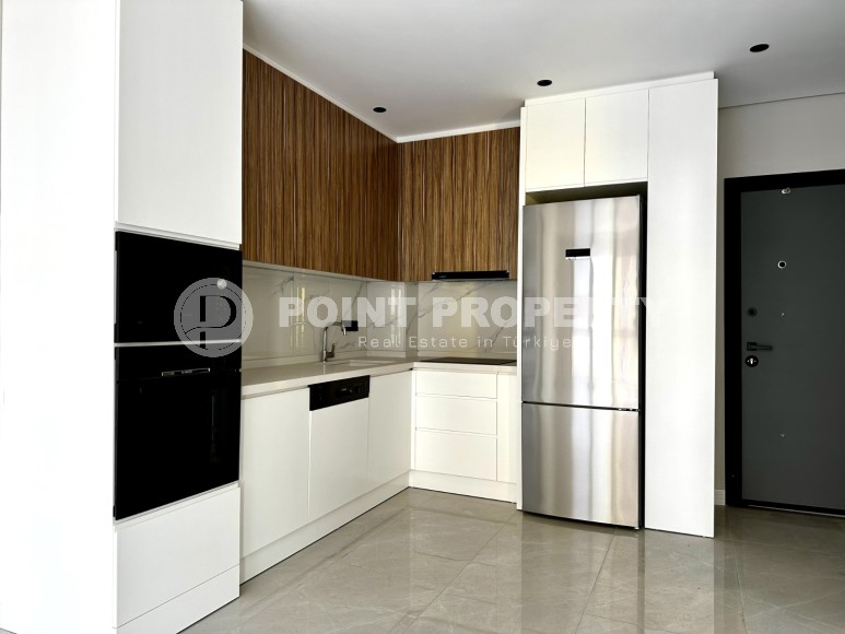 Новая квартира 1+1 в резиденции премиум класса, введенной в эксплуатацию в 2023 году, в 400 метрах от знаменитого пляжа Клеопатры-id-7512-фото-4