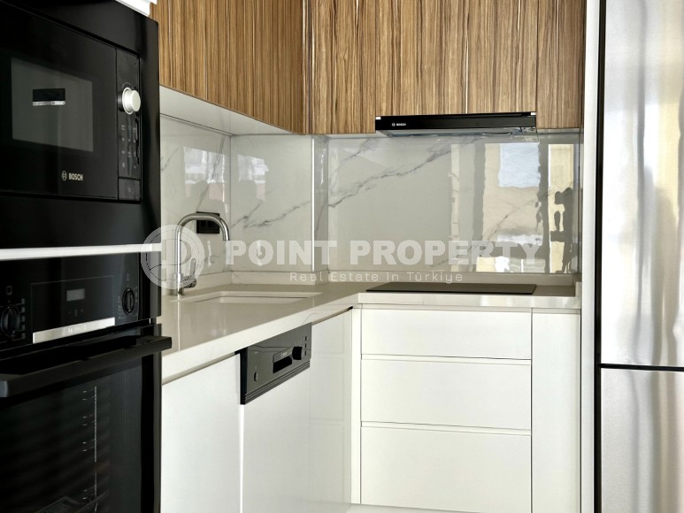 Новая квартира 1+1 в резиденции премиум класса, введенной в эксплуатацию в 2023 году, в 400 метрах от знаменитого пляжа Клеопатры-id-7512-фото-6