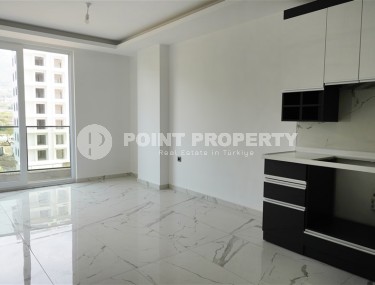 Compact new apartment with fine finishing, within walking distance from the center of the popular area of Alanya - Mahmutlar-id-7513-photo-3