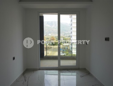 Compact new apartment with fine finishing, within walking distance from the center of the popular area of Alanya - Mahmutlar-id-7513-photo-4