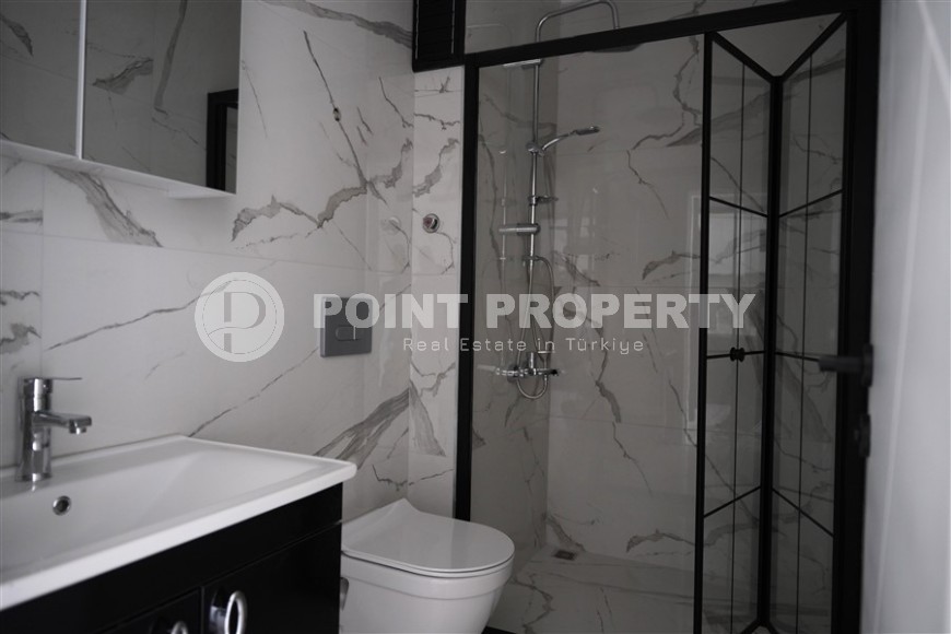 Компактная новая квартира с чистовой отделкой, в нескольких минутах ходьбы от центра популярного района Аланьи -  Махмутлар-id-7513-фото-6