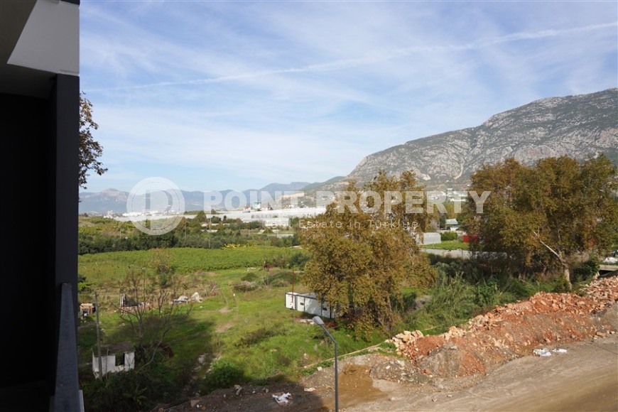 Компактная новая квартира с чистовой отделкой, в нескольких минутах ходьбы от центра популярного района Аланьи -  Махмутлар-id-7513-фото-9