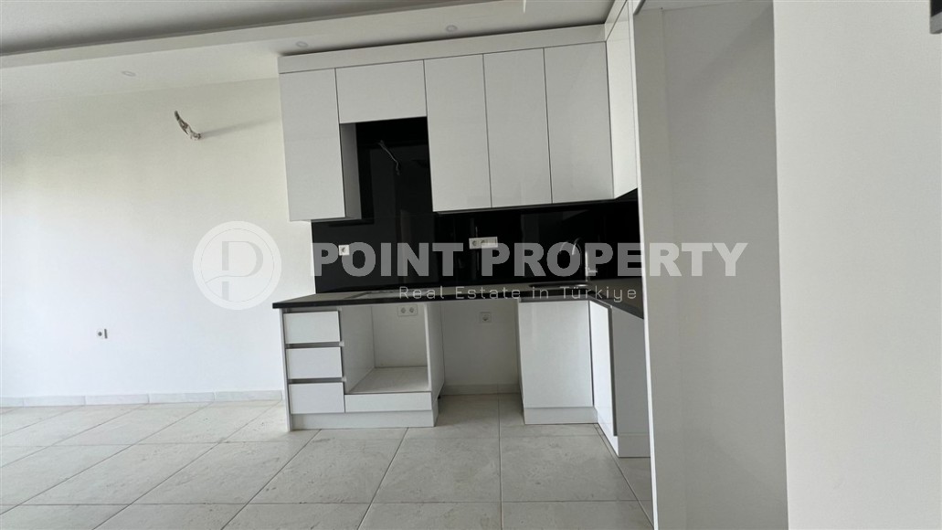 New apartment in a luxury residential complex with a “city within a city” infrastructure, in the center of the modern area of Alanya - Mahmutlar-id-7516-photo-3