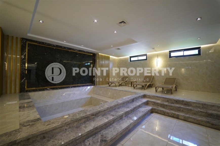 New apartment in a luxury residential complex with a “city within a city” infrastructure, in the center of the modern area of Alanya - Mahmutlar-id-7516-photo-12