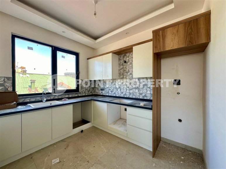 Панорамная квартира с видом на море и горы, на 5-м этаже с мансардой в спокойном районе Аланьи - Демирташ-id-7519-фото-3