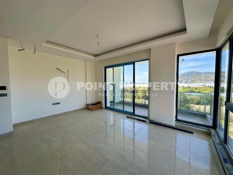 Панорамная квартира с видом на море и горы, на 5-м этаже с мансардой в спокойном районе Аланьи - Демирташ-id-7519-фото-5