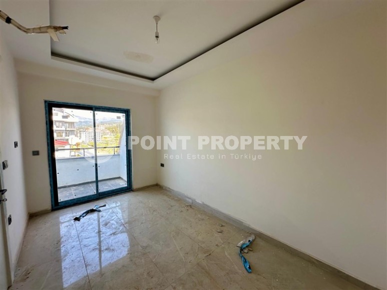 Панорамная квартира с видом на море и горы, на 5-м этаже с мансардой в спокойном районе Аланьи - Демирташ-id-7519-фото-7