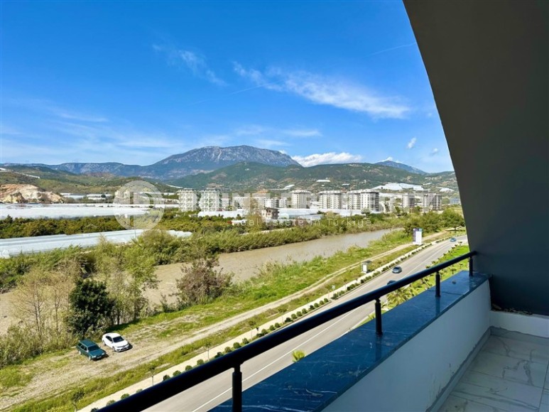 Панорамная квартира с видом на море и горы, на 5-м этаже с мансардой в спокойном районе Аланьи - Демирташ-id-7519-фото-13