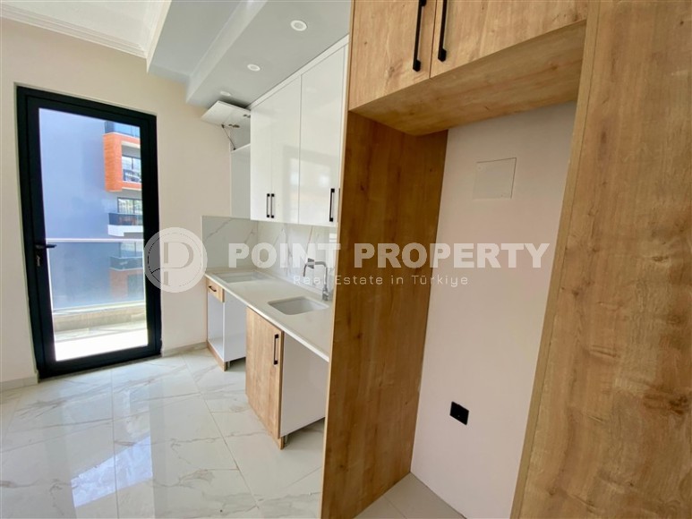 Небольшая новая квартира с качественной чистовой отделкой в полутора километрах от моря, в живописном районе Аланьи - Авсаллар-id-7520-фото-3