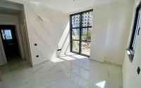Небольшая новая квартира с качественной чистовой отделкой в полутора километрах от моря, в живописном районе Аланьи - Авсаллар-id-7520-фото-5