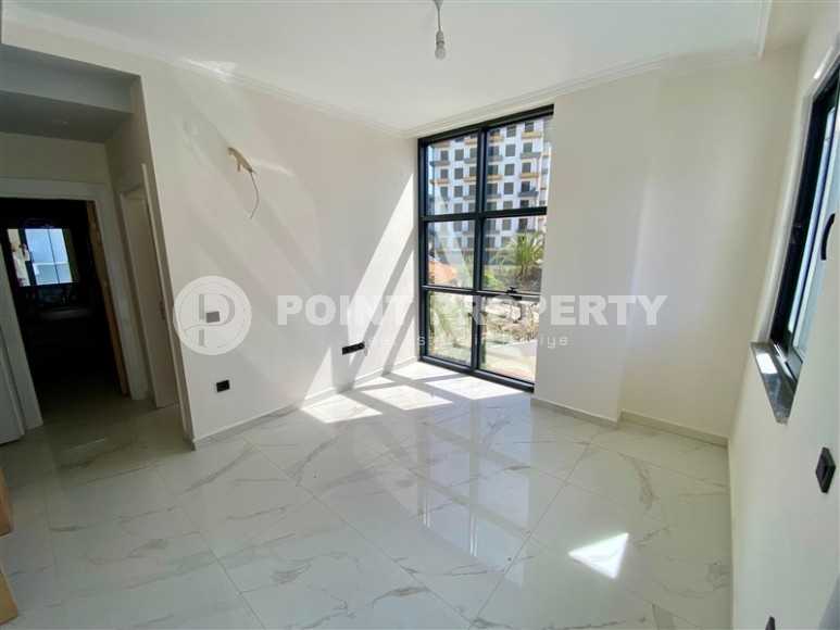 Небольшая новая квартира с качественной чистовой отделкой в полутора километрах от моря, в живописном районе Аланьи - Авсаллар-id-7520-фото-5