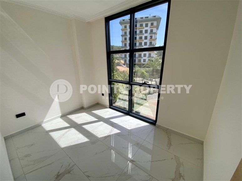 Небольшая новая квартира с качественной чистовой отделкой в полутора километрах от моря, в живописном районе Аланьи - Авсаллар-id-7520-фото-6