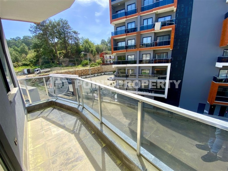 Небольшая новая квартира с качественной чистовой отделкой в полутора километрах от моря, в живописном районе Аланьи - Авсаллар-id-7520-фото-9