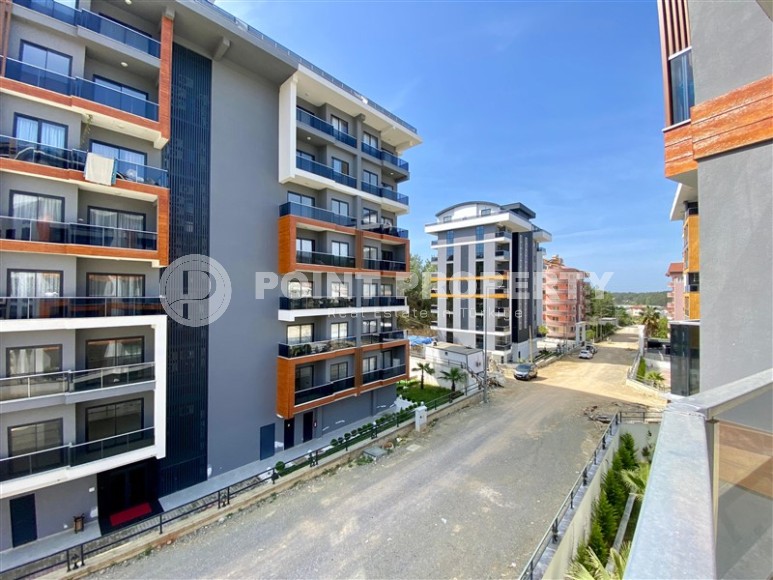 Небольшая новая квартира с качественной чистовой отделкой в полутора километрах от моря, в живописном районе Аланьи - Авсаллар-id-7520-фото-10