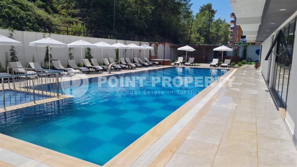 Небольшая новая квартира с качественной чистовой отделкой в полутора километрах от моря, в живописном районе Аланьи - Авсаллар-id-7520-фото-19