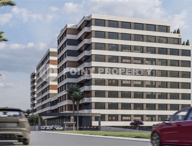 Studios and linear apartments in a residential complex under construction, in the center of the promising area of Mersin - Tomyuk-id-7529-photo-1