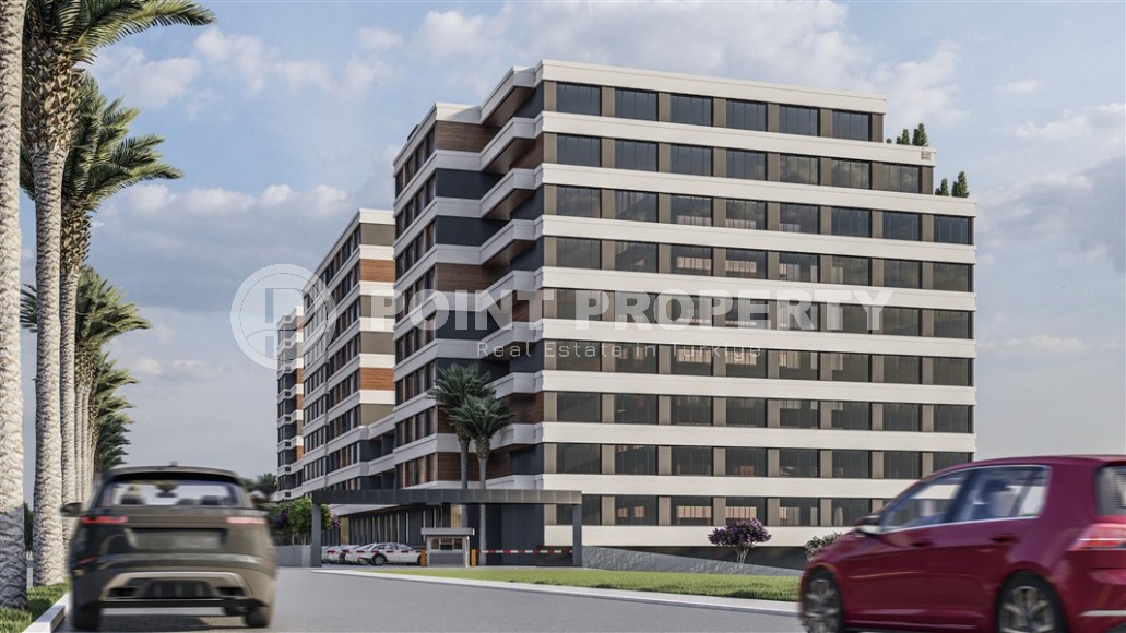 Студии и линейные квартиры в строящемся жилом комплексе, в центре перспективного района Мерсина - Томюк-id-7529-фото-1