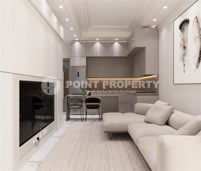 Студии и линейные квартиры в строящемся жилом комплексе, в центре перспективного района Мерсина - Томюк-id-7529-фото-2