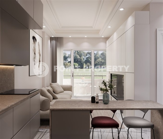 Студии и линейные квартиры в строящемся жилом комплексе, в центре перспективного района Мерсина - Томюк-id-7529-фото-3