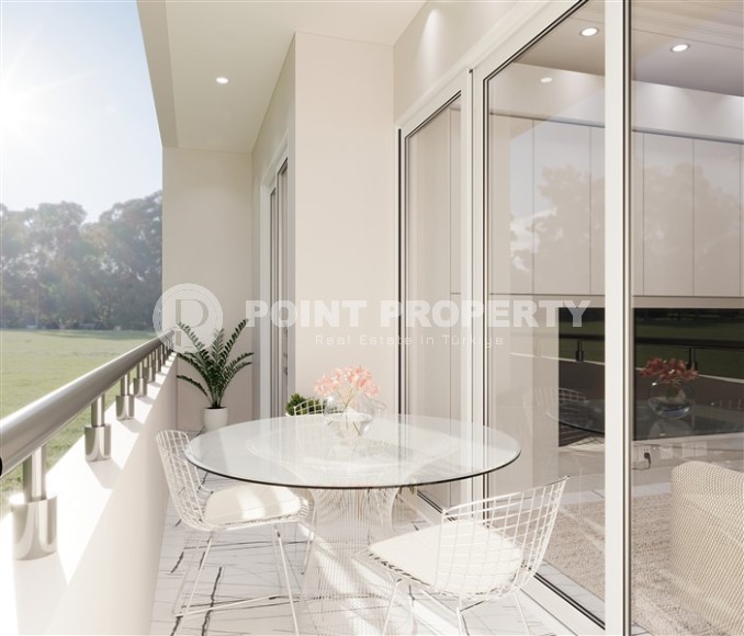 Студии и линейные квартиры в строящемся жилом комплексе, в центре перспективного района Мерсина - Томюк-id-7529-фото-8