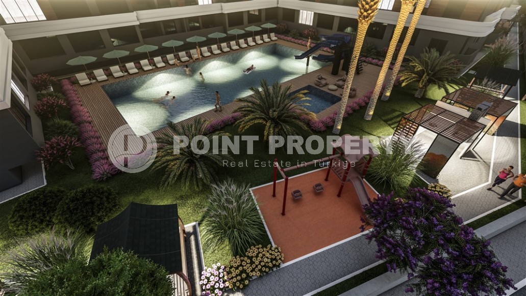 Студии и линейные квартиры в строящемся жилом комплексе, в центре перспективного района Мерсина - Томюк-id-7529-фото-11