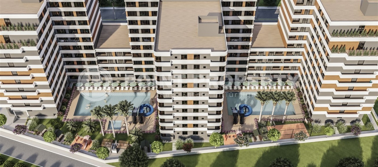 Студии и линейные квартиры в строящемся жилом комплексе, в центре перспективного района Мерсина - Томюк-id-7529-фото-15