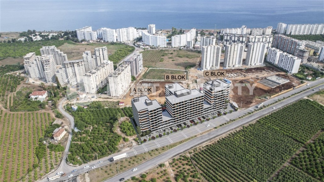 Студии и линейные квартиры в строящемся жилом комплексе, в центре перспективного района Мерсина - Томюк-id-7529-фото-17