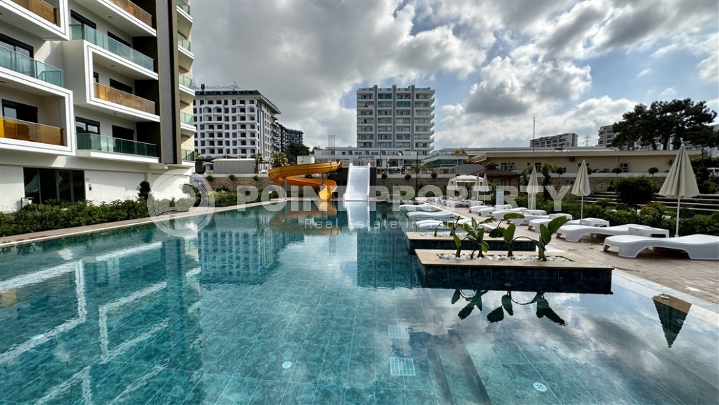 Апартаменты в жилом комплексе премиум класса  в 750 метрах от моря, в перспективном районе Аланьи - Авсаллар-id-7317-фото-14