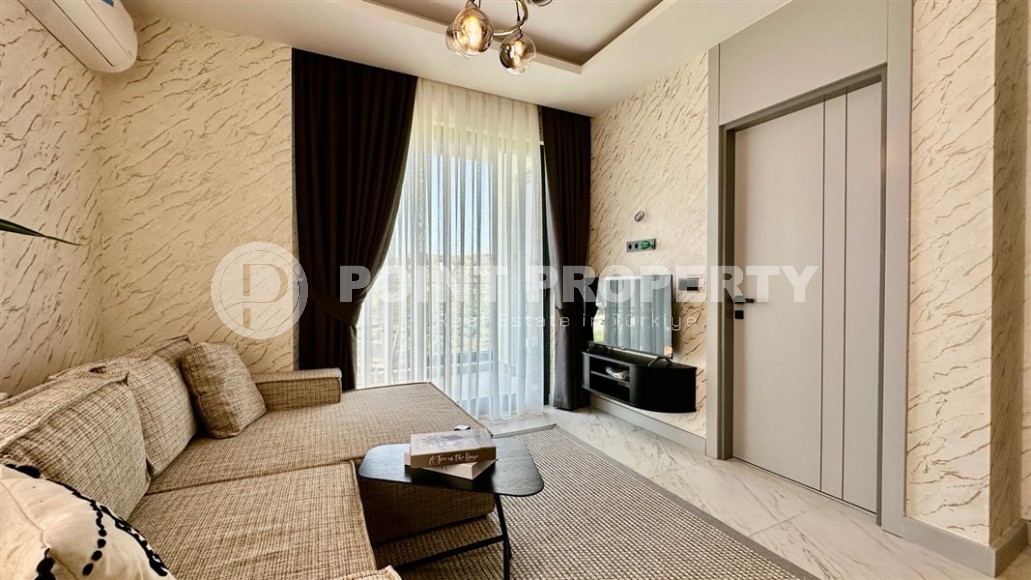 Атмосферная квартира с современным дизайном и видом на горы, в зеленом, экологически чистом районе Аланьи - Каргыджак-id-7530-фото-2