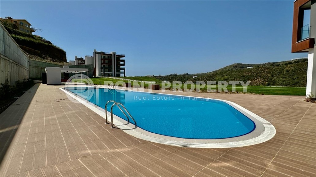 Атмосферная квартира с современным дизайном и видом на горы, в зеленом, экологически чистом районе Аланьи - Каргыджак-id-7530-фото-11