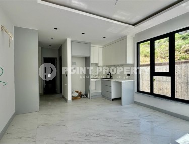 Новая квартира с чистовой отделкой в полутора километрах от моря, в престижном районе Аланьи - Каргыджак-id-7531-фото-2