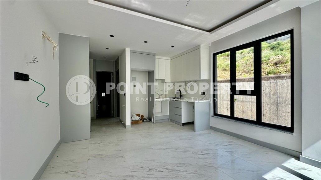 Новая квартира с чистовой отделкой в полутора километрах от моря, в престижном районе Аланьи - Каргыджак-id-7531-фото-2